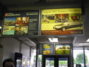 Image of advertising display boxes inside the STS terminal