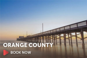 Image of a pier in orange county with the book now button